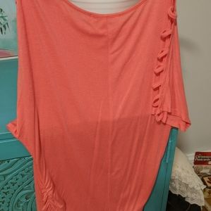 Small, coral top. Slash style shoulders. Stretchy